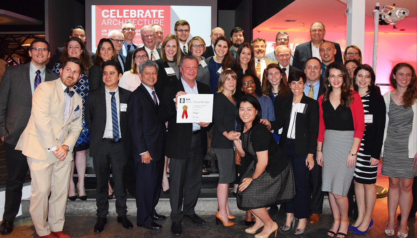 Pagers gather around Senior Principal Mattia Flabiano, who is holding the Firm of the Year award. - Page