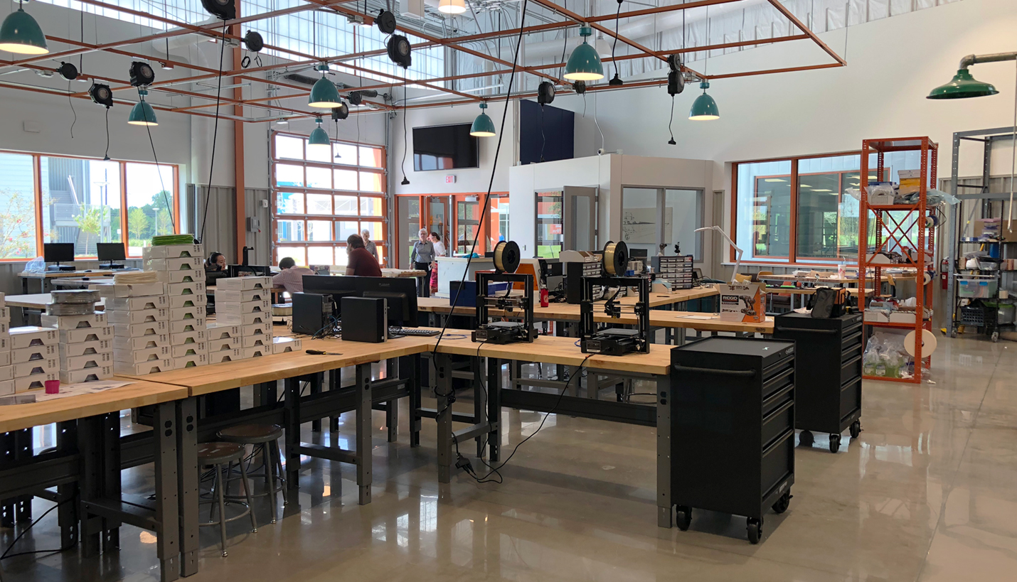 One of several workspaces in the new BakerRipley Fab Lab prior to its opening. - Page
