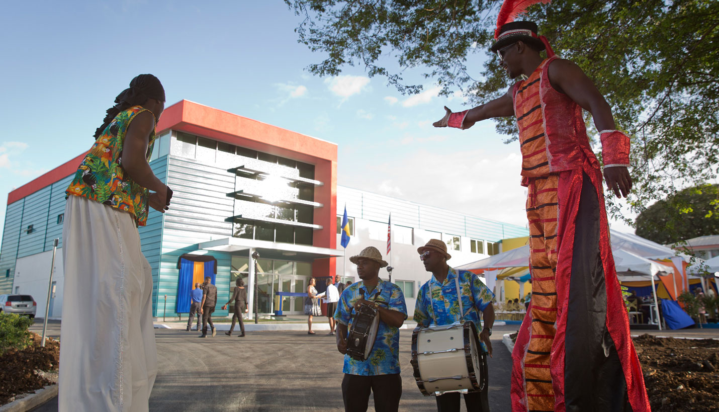 Attendees at the grand opening of the Barbados National Medical Reference Laboratory were greeted by cultural representatives. - Jacob Krupnick, Wild Combination Photography
