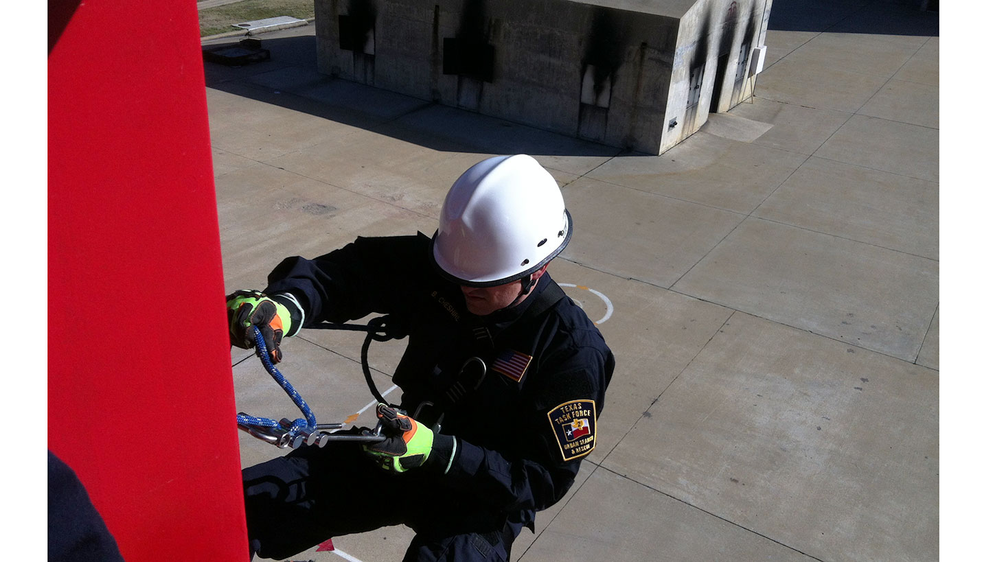Brad Cheshire, a member of Texas Task Force 2 Search & Rescue Team, during ropes rescue training. - 