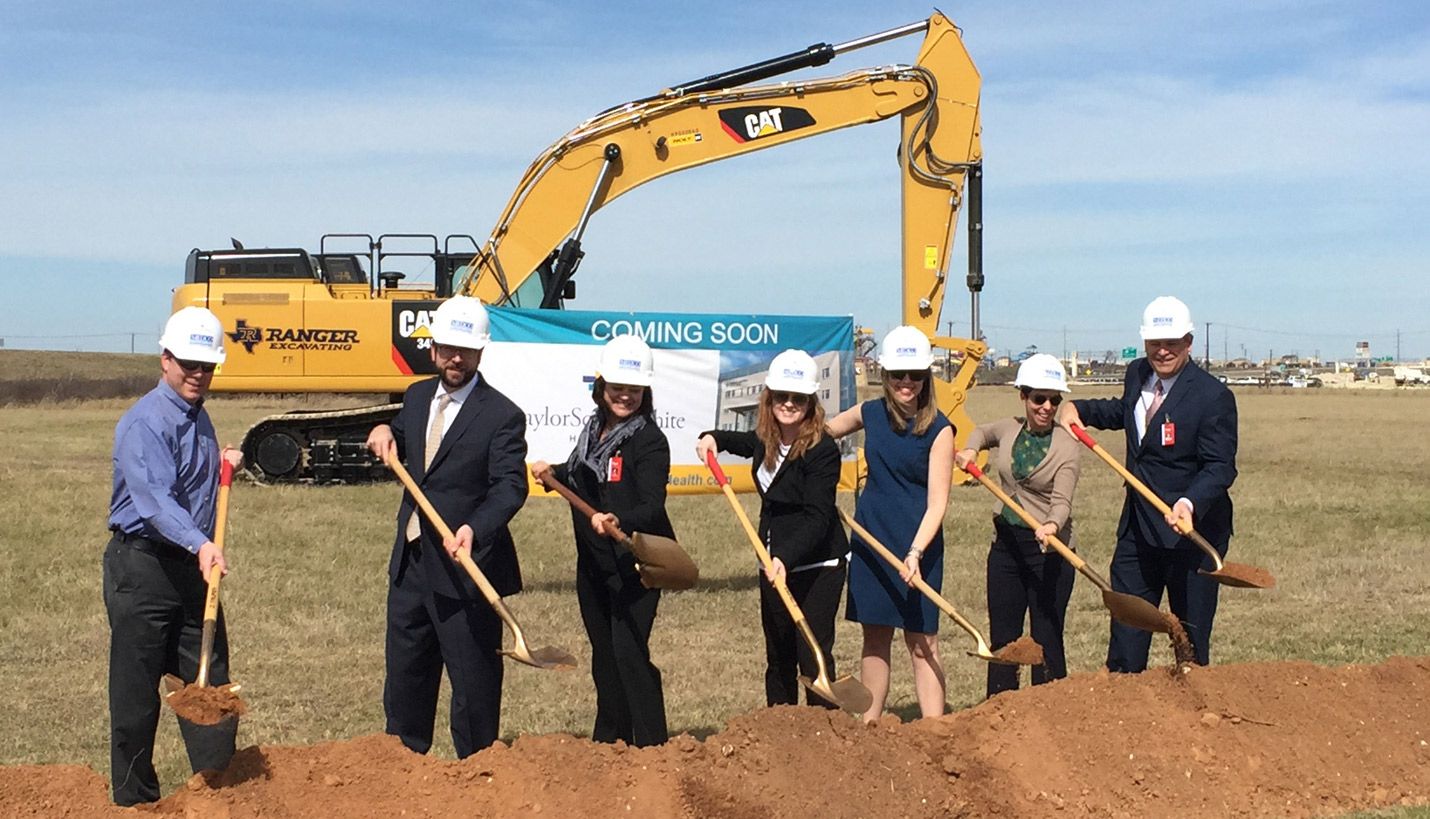 Pagers wielding their shovels (left to right): Erik Mansell, Bret Wittman, Annelie Persson Call, Beth Carroll, Lisa Bradley, Aimee Burmaster Hicks and Robert Doane. - 