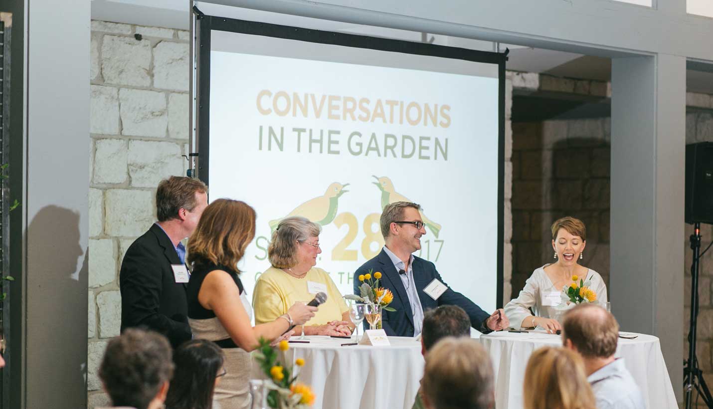 Conversation in the Garden panelists introduced by Page Principal Wendy Dunnam Tita. - 