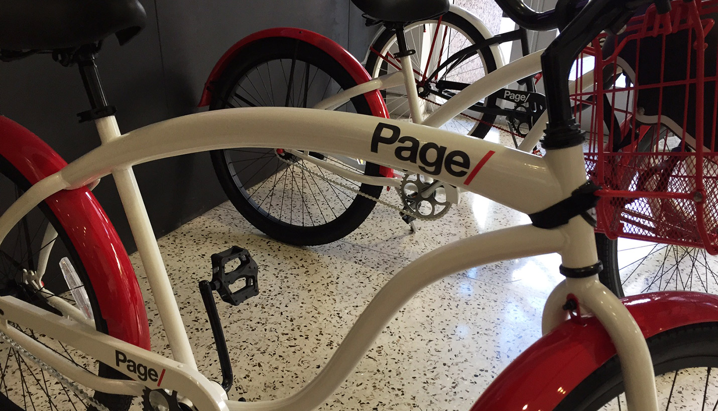 The custom-branded Page bicycles support the firm's commitment to the AIA 2030 Challenge of reducing carbon emissions in our work. - 