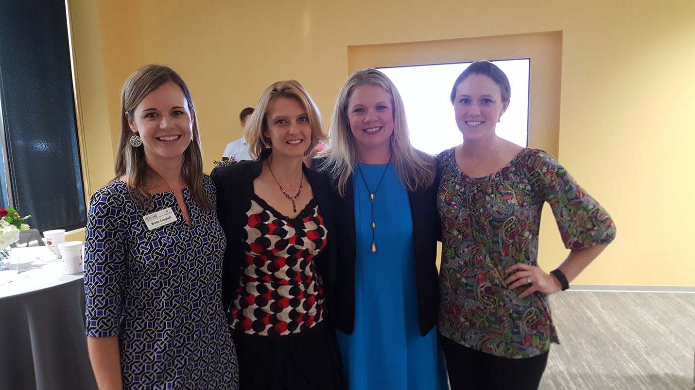 From left to right: The Hotline CDO Kristin DeLong Campbell, Page Associate Principal Jen Bussinger, The Hotline CEO Katie Ray-Jones and Page Designer Katie Badiyan - 