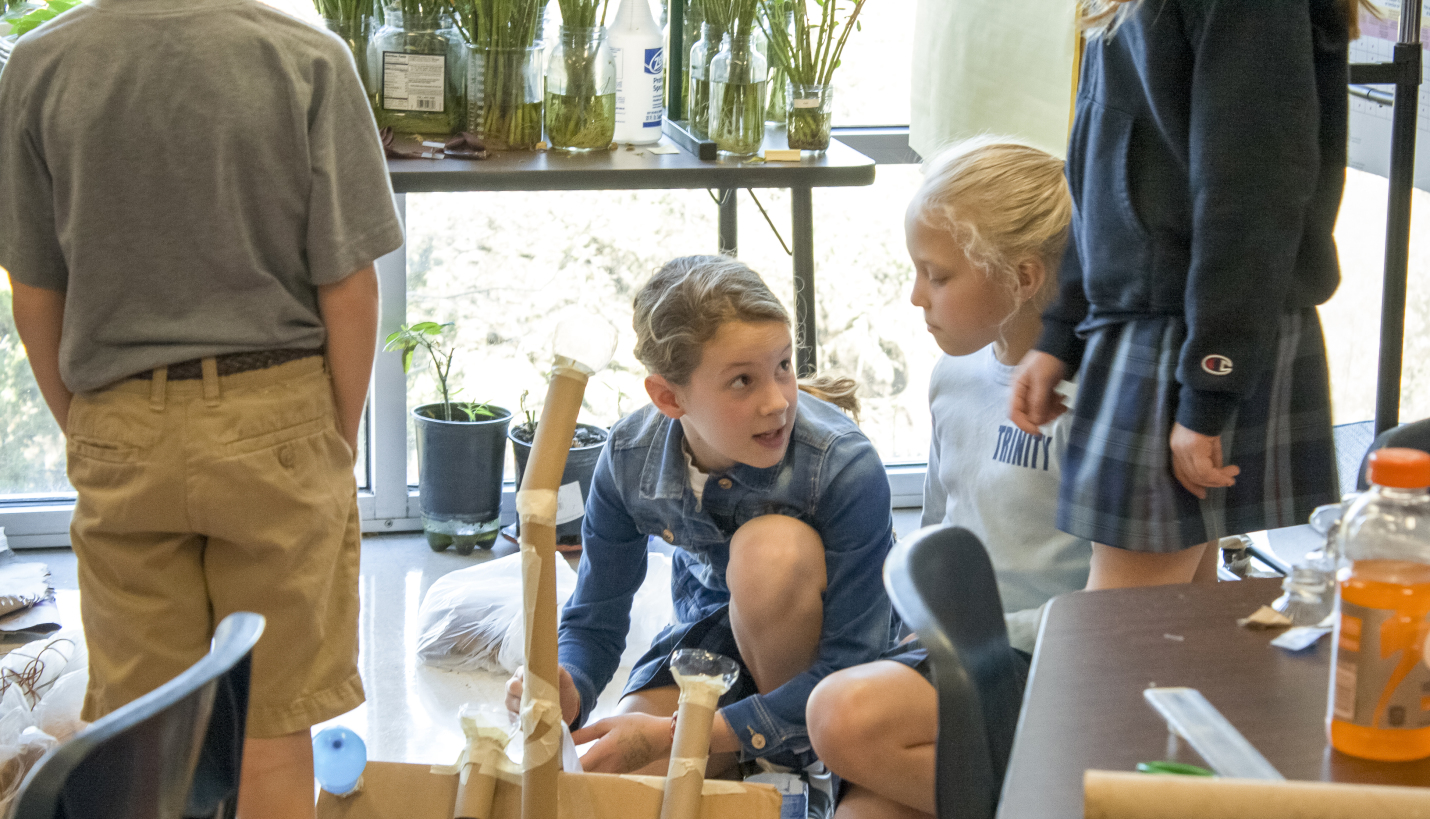 Trinity Episcopal students work on a STEAM (Science, Technology, Engineering, Arts & Math) exercise together. - Page