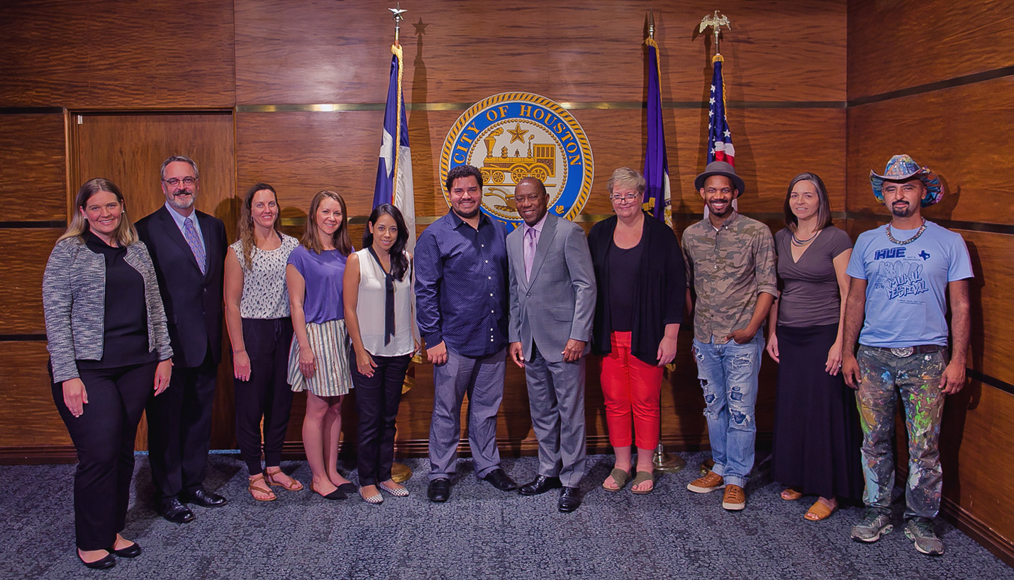 Tami Merrick, fourth from the right, stands next to City of Houston Mayor Sylvester Turner and her fellow facilitators for the inaugural class of Artist, INC. in Houston. - Morris Malakoff