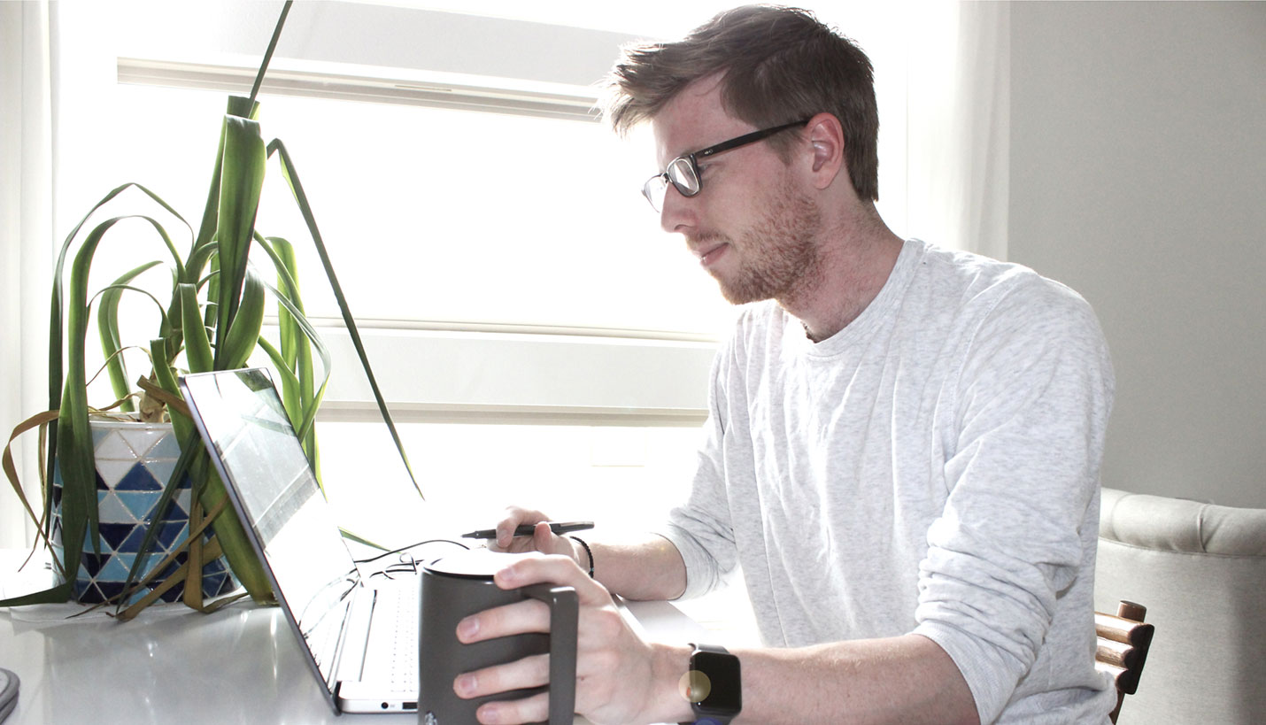 Page Designer William Sheffield incorporates daylighting into his WFH setup. - Page